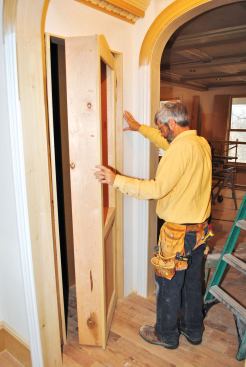 Once the plates were in place, it was easy to swing the cabinet into position and secure it with the cap screw.