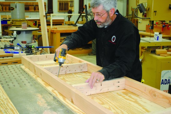 With the drilling jig properly adjusted, framing lumber can be pocket screwed for things such as this workbench top.