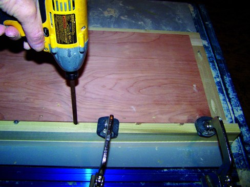 The same clamps that work in the plate system also key into tracks that can be mounted directly to the edge of the workbench.