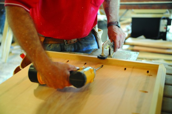 The author uses pocket screws to attach edging to plywood for shelving or a mantel. Plywood is stronger and more stable than solid wood.