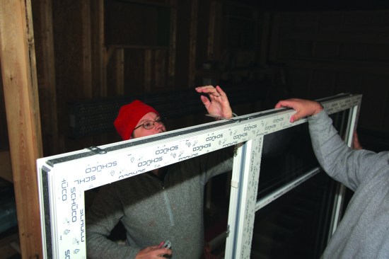 Metal installation brackets snapped into grooves in the edges of the window unit.
