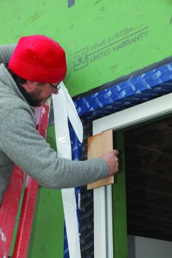 The butt edge of a cedar shingle worked well for pressing the tape into the corners.