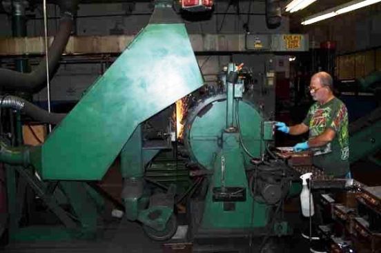 A mechanized grinding process in action.