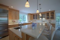 Pendants above an island can provide ambient light on their own.