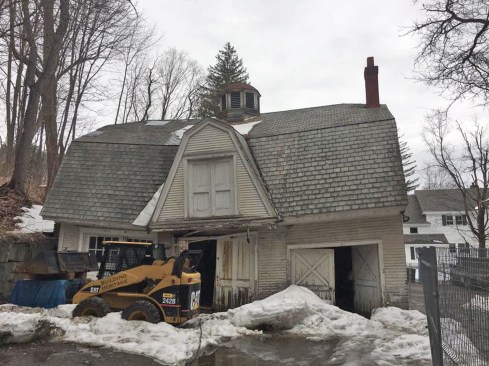 The worst damage centered around a transverse dormer.