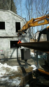 I-beams were inserted longitudinally to help level the second floor.