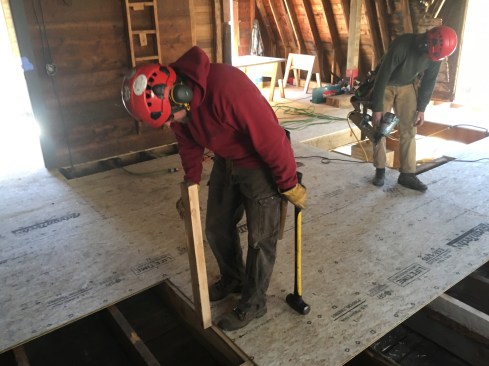 Sheathing the second floor helped square up the building.