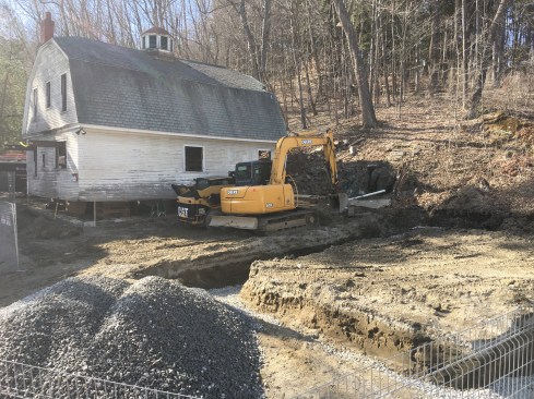 While the author’s crew restored the structure’s framing, the excavation sub broke ground on a new foundation.