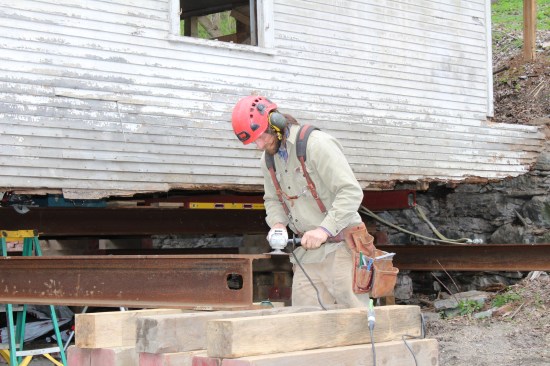 The I-beam track needed to be ground smooth to eliminate imperfections.