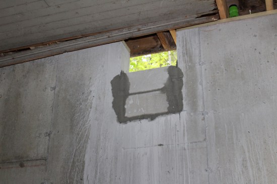 The retaining wall beam pockets were blocked in.