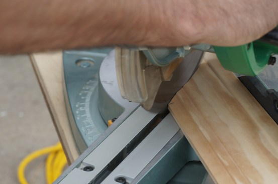 The head casing is mitered at both ends. After marking the measurement, be careful to make the opposite miter cut right to the line.