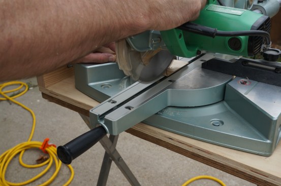 To make the tiny return pieces, first make a bevel cut on the end of the stock and then cut it square.