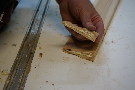 Put glue on both the return and the bevel cut on the end of the apron.