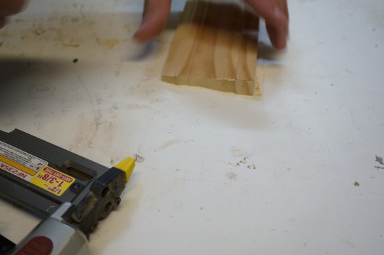 Tiny 23-gauge pins hold the return in place until the glue has cured.