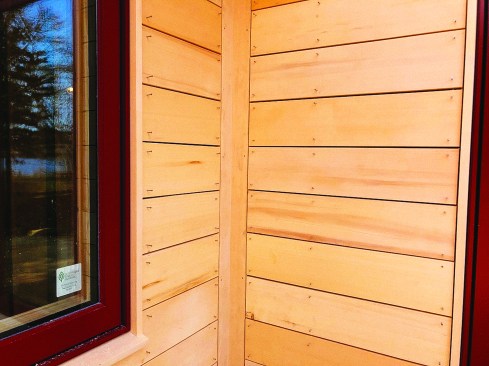 In an open rainscreen, the siding nails to the furring strips with air gaps between the boards.