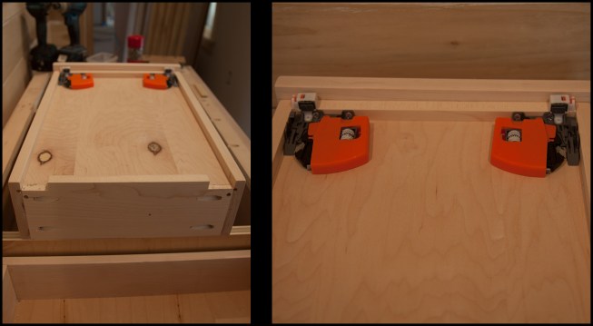 The drawer boxes arrived from the manufacturer ready to receive the self-closing undermount slides; a pair of half-inch notches are made in the drawer’s rear panel on either side to accommodate the slides (photo, left), A pair of locking devices (shown at the front of the drawer) allow for fine-tuning the drawer’s alignment (photo, right). Installation is as simple as dropping the drawer into the opening and pushing it home to an audible click. 