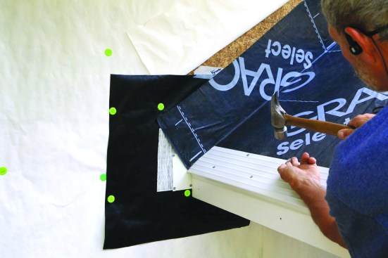After the ice-dam protection is installed, the drip edge goes in. Be sure to leave it 1/4 inch short of the wall.