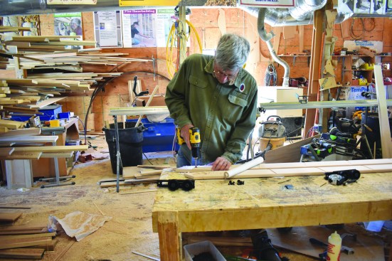 He drills a slot for the top rung.