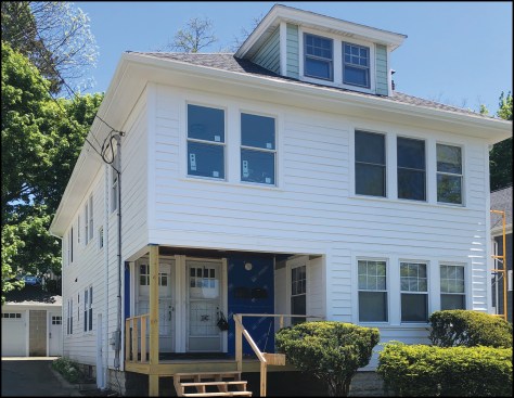 Figure 8. When completed with new gutter all around, the 100-plus-year-old home looks as straight and new as the day it was built. You would have no clue that old, multilayered, out-of-whack eaves were behind the new work.