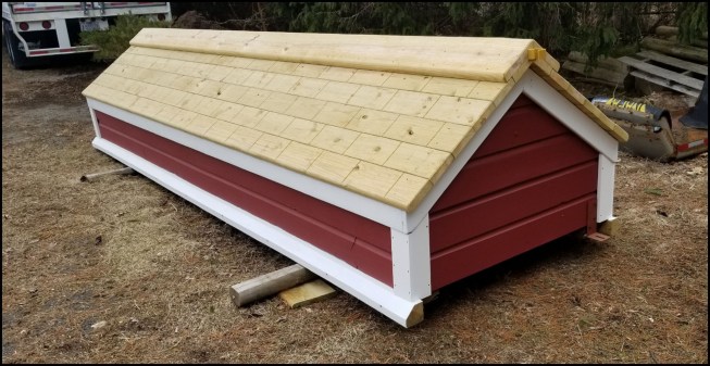 A recently completed a barn-style jump.