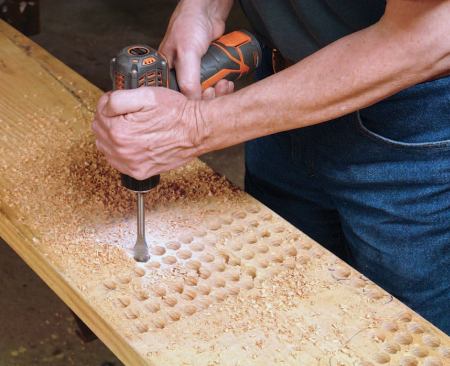 The author mounted a new Irwin 3/4-inch Speedbor spade bit in each drill/driver, then counted the number of holes he could drill through 2-by Douglas fir per charge in high gear. He tested both of the batteries included with each tool.