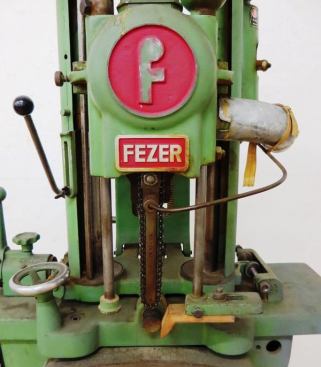 This chainsaw mortiser is from Fezer, a company that merged with Stoll to become Fezer & Stoll, which later became Festo. Festo spun off its tool division in 2000 renamed it Festool.