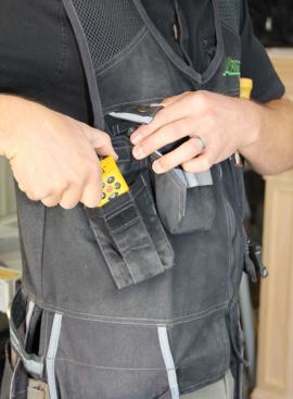 The Velcro flapped pocket on the right is large enough to hold most smart phones. But a bulky case will make it harder to fit in there. My iPhone 5 will go in but it’s too tall so the flap can’t be closed. I usually keep a laser distance measurer in this pocket because it fits perfectly and is a tool I need to get at all the time.