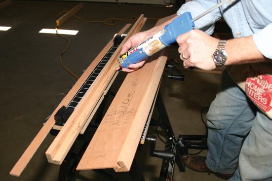Newel construction starts with four 2x2 oak balusters with one corner ripped out. Plywood panels are glued with PL400.
