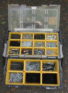 It’s important to me to have a big assortment of screws on hand because I want to be able to deal with any situation that comes up without having to go to the hardware store. I usually keep screws in Sortainers but need to carry a larger variety in my cart so I purchased this inexpensive Keter brand cantilevering box at the local super store.