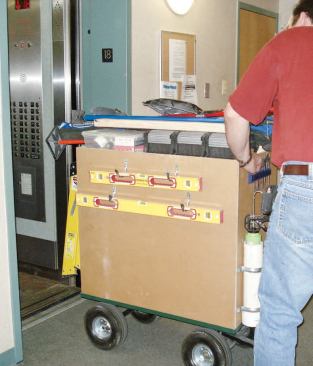 They set up a dedicated "cabinet installation wagon" that was compact enough to fit into an elevator.