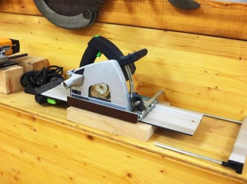 I’m not sure when this track saw was made but it had to be before 2000, when the brand changed from Festo to Festool. The dust port on this machine looks kind of odd, as if it can be pivoted between high and low positions, or perhaps removed altogether. I have no idea what that’s about.