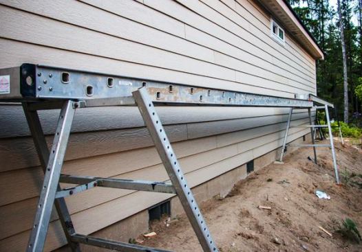 Planks. We own several 14” x 24” aluminum staging planks. The newest of them are from Alum-a-pole and were purchased used on Craigslist a few years back. We like them better than our old ones because they are stiffer. One of our aluminum planks is 20” wide; we like working off it but not lifting it. A framer from another company once teased us about the 20” plank, calling it a 6-pack plank, one so wide you could walk on it after drinking a 6-pack and not fall off.