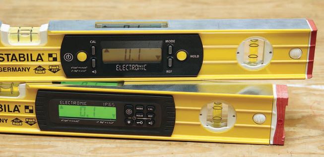 The Stabila Type 196E Tech (top) is being replaced by the IP65 Tech (bottom). New features include a backlight for much easier viewing in dim light, better seals, and bouncier removable end caps.