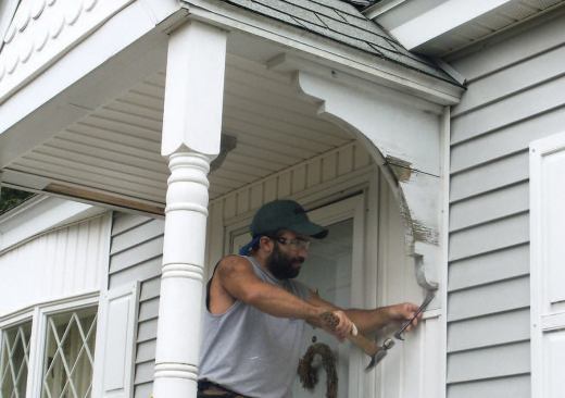 The wooden brackets on this front porch had seen better days.