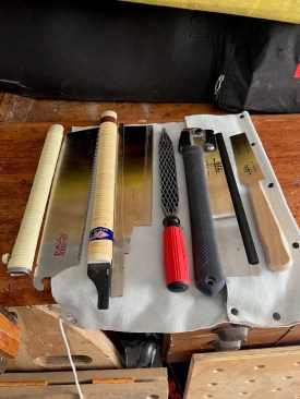 A tool roll works well to organize a select number of the author's Japanese pulls saws.