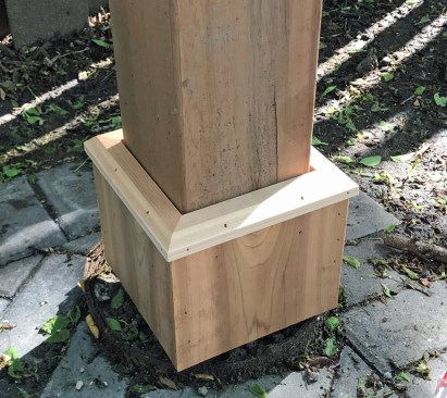 This space can be capped, leaving a smaller space of about 3/16 inch between the trim and the column.