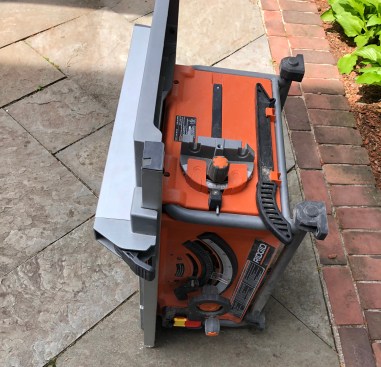 Tabs—“feet” I guess you could call them when the saw is standing on edge—protect the table while the saw is stored vertically in the shop or in transit.