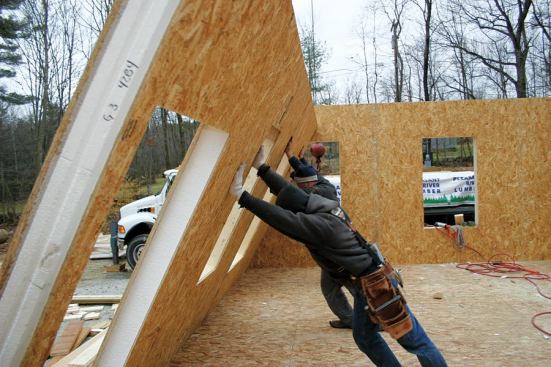 The wall is then stitched together and raised.