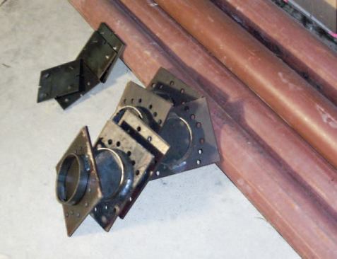 On this job, I ordered Springfield plates for the caps; these have a welded ring of steel that prevents the column from moving sideways.