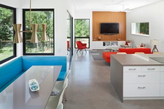 This Forge Craft Architecture house is well designed with rich spaces, yet it’s only 2,000 square feet. Note the built-in dining nook off the kitchen.