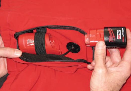 Power is supplied by a compact 12-volt lithium-ion battery pack tucked away in an unobtrusive side pocket.