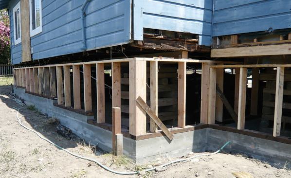 The house was placed on a new foundation and pony walls.
