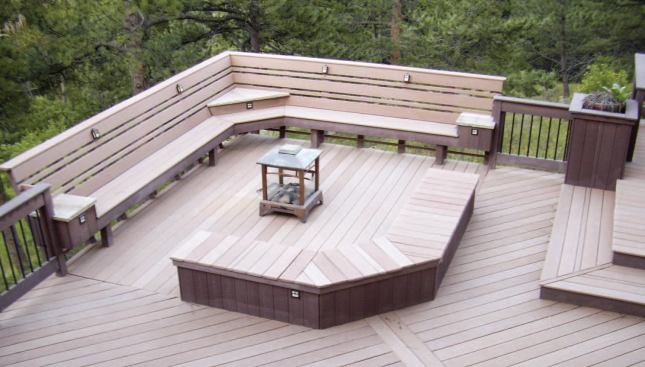 When this deck was built under the 2003 IRC, the slanted benchback, which is 24 inches tall, was considered a compliant guard.