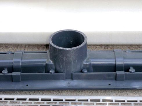 The Mapei ShowerPerfect Linear Drain system is used for renovations in which a bathtub is being replaced by a shower stall. The drain outlet  can be connected to the waste line with either a standard glue-in connector or a hubless connection.

