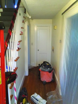 A kitchen renovation made this hallway unnecessary for access, so it became the ideal place for a new bathroom.