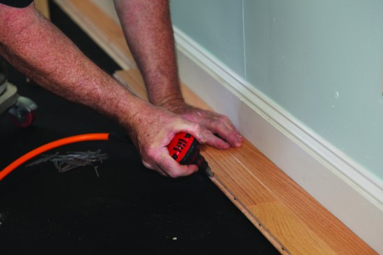 Fairly new on the market, a palm nailer designed specifically to drive cleat nails for wood flooring is much faster than hand nailing.