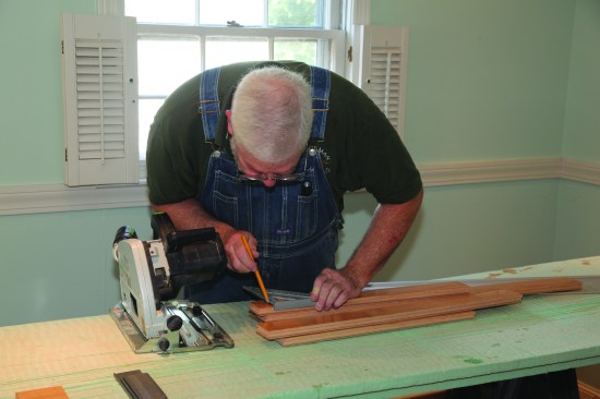 Lines are squared across the boards at the length marks.