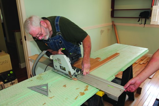 The boards are then lined up and the track saw cuts all of them at once.