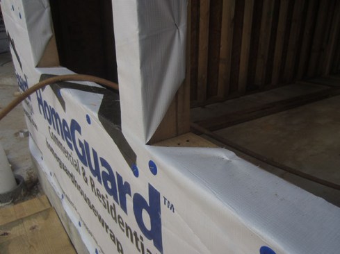 Housewrap. Most window-flashing instructions tell you to cut the housewrap in an inverted “Y” and turn the housewrap in along the sill and jambs. In doing so, the housewrap serves as a primary jamb flashing. In my opinion, this is wrong. If peel-and-stick is not adhered directly to the rough openings’ wood surfaces, water has the potential to travel between the framing and the housewrap. The whole point of using a peel-and-stick flashing is to protect the innermost wood components.