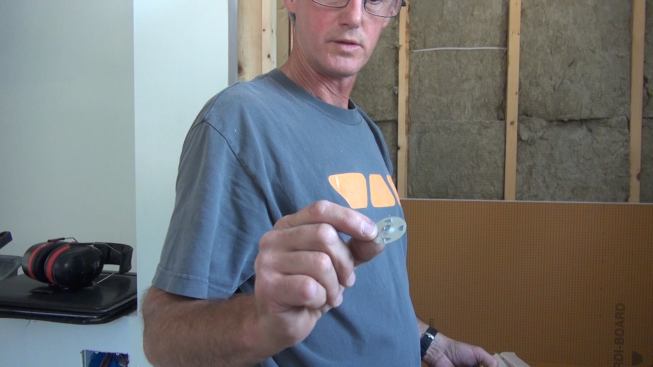 Special washers are used to screw boards securely to framing. Points in the washer pierce the foam's synthetic skin to hold the washer in place before the screw is driven.